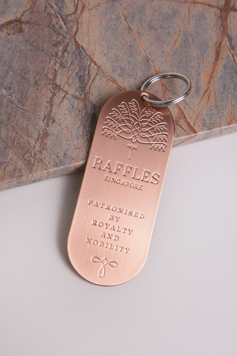 ラッフルズ ヤシのデザインの真鍮製キーリング /Raffles Brass Plate Palm Key Ring Raffles Arcade
